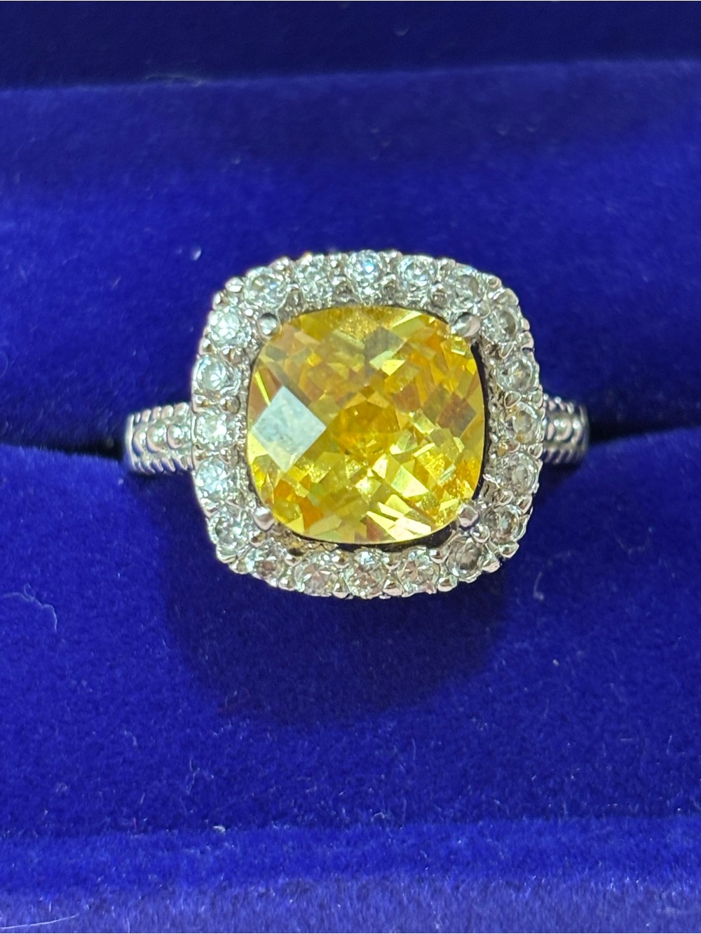 Yellow Cushion-Cut Halo Ring with Clear Accent Stones